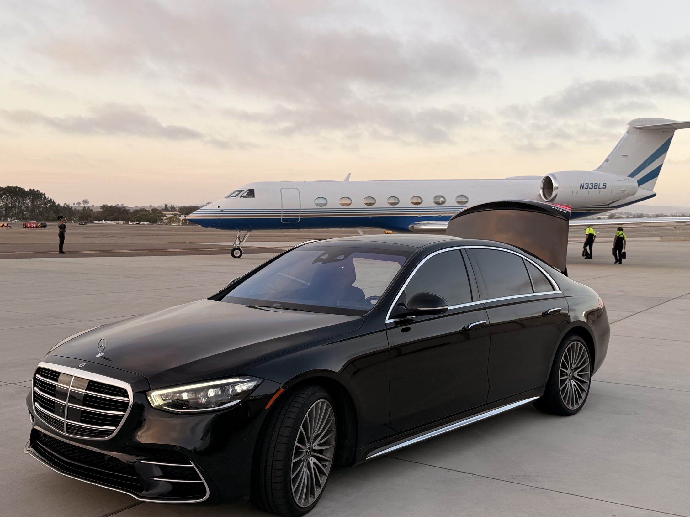 Mercedes-Benz S580 planeside at sunset
